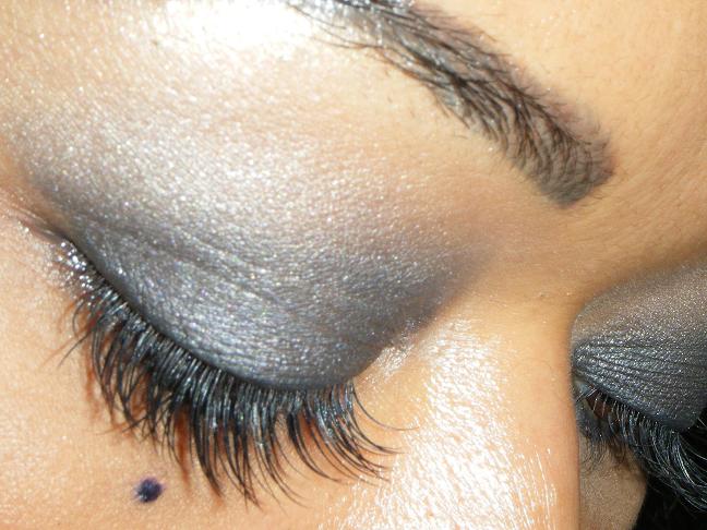 Jennifer Fitzpatrick applying makeup to a client — Lashmajick beauty studio Timonium MD